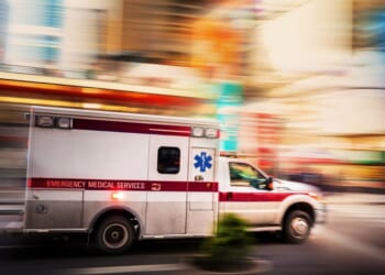 An ambulance races through Manhattan in a file photo from 2022.
