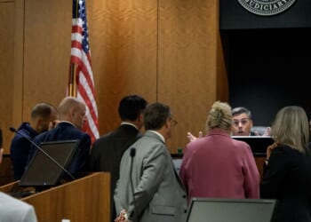 Tyler Robinson, who is accused in the fatal shooting of Charlie Kirk, sits while Judge Tony Graf conferences with attorneys during a preliminary hearing at the Fourth District Courthouse on July 9, 2026, in Provo, Utah.
