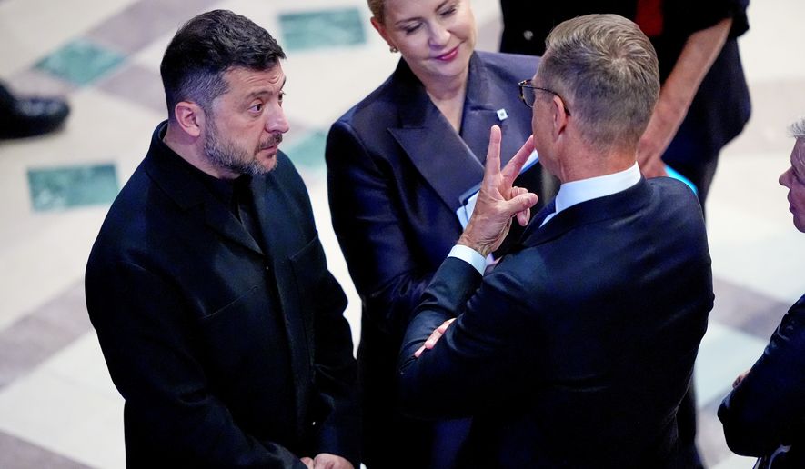 President of Ukraine, Volodymyr Zelenskyy, speaks with the President of Finland, Alexander Stubb, before the funeral service for Sen. Lindsey Graham, R-S.C., Tuesday July 28, 2026, at the Washington National Cathedral in Washington. (AP Photo/Jacquelyn Martin)