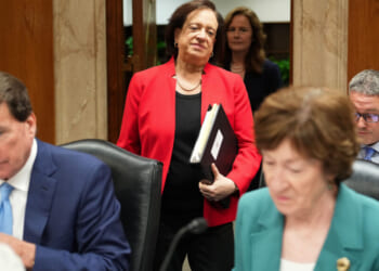 Supreme Court Associate Justices Elena Kagan and Amy Coney Barrett arrive to testify before a Senate Appropriations Subcommittee on July 14, as Sens. Bill Haggerty, R-Tenn., and Susan Collins, R-Maine, prepare. ( Eric Lee/Getty Images)