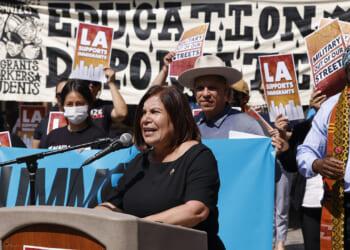 Angelica Salas, director of the Coalition for Humane Immigrant Rights in Los Angeles, speaks at an immigration rally.