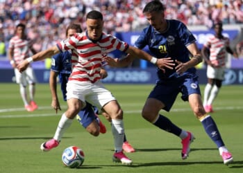 Sergino Dest, left, #2 of the United States is challenged by Stjepan Radeljic #21 of Bosnia and Herzegovina during the FIFA World Cup 2026 Round of 32 match Wednesday at San Francisco Bay Area Stadium in Santa Clara, California.
