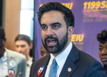 Zohran Mamdani talks to reporters at SEIU event.