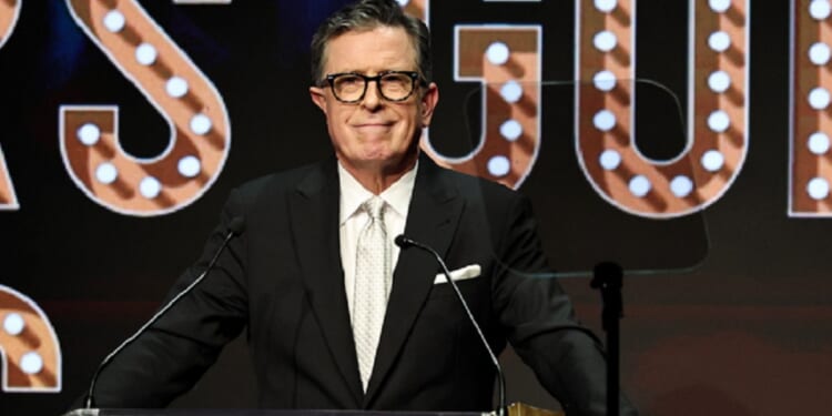 Then-CBS host Stephen Colbert is pictured in a March file photo from the Writers Guild Awards ceremony in New York City.
