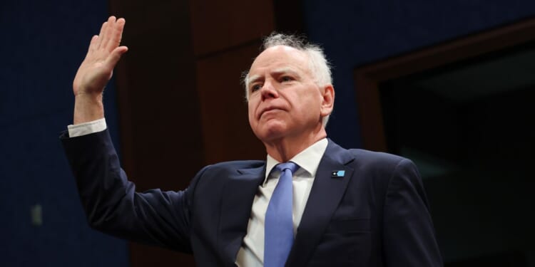 Minnesota Gov. Tim Walz is sworn in as he testifies during a House Oversight and Government Reform Committee hearing in the U.S. Capitol Building on March 4, 2026, in Washington, D.C.