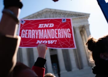 Gerrymandering protesters demonstrate outside the Supreme Court building on March 19, 2019.