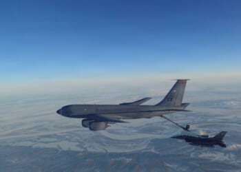 In this handout photo provided by the U.S. Department of War, a North American Aerospace Defense Command F-16 Fighting Falcon fighter refuels from a KC-135 Stratotanker over Western Alaska on Feb. 19, 2026.