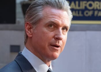 Gavin Newsom looks to photographers at the 19th California Hall of Fame ceremony on March 19, 2026.