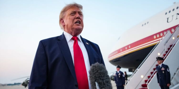 President Donald Trump speaks to reporters after landing in Air Force One on July 19, 2026, in Joint Base Andrews, Maryland.