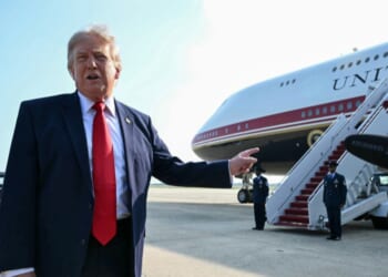 President Donald Trump speaks to the press before he boards Air Force One for his first flight aboard the Boeing 747-8 that Qatar gifted the United States to use for executive travel, at Joint Base Andrews, in Maryland, July 1, 2026.