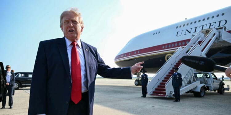 President Donald Trump speaks to the press before he boards Air Force One for his first flight aboard the Boeing 747-8 that Qatar gifted the United States to use for executive travel, at Joint Base Andrews, in Maryland, July 1, 2026.