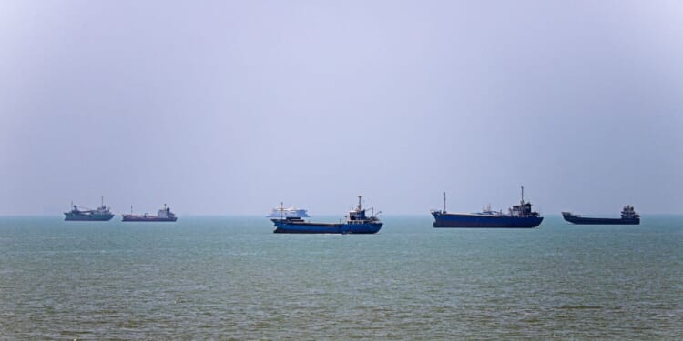In this picture obtained from Iran's ISNA news agency on June 18, 2026, vessels are seen anchored in Bandar Abbas along the Strait of Hormuz.