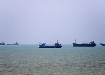 In this picture obtained from Iran's ISNA news agency on June 18, 2026, vessels are seen anchored in Bandar Abbas along the Strait of Hormuz.