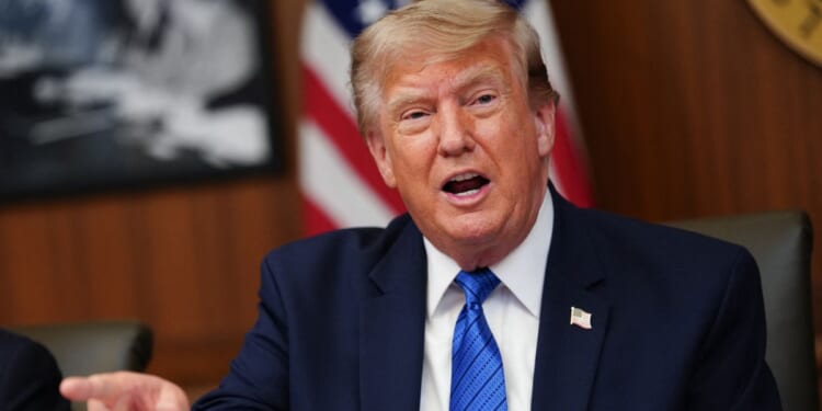President Donald Trump speaks Friday during a Cabinet meeting at Camp David in Maryland.