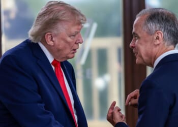 President Donald Trump speaks with Canadian Prime Minister Mark Carney at a June meeting. Trump and Carney painted completely different pictures about the tariff situation between their respective countries this week.