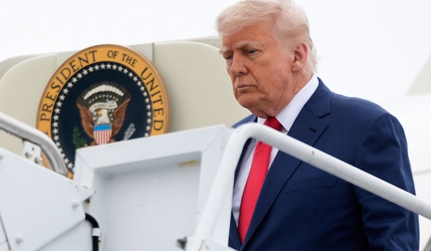 President Donald Trump arrives on Air Force One at Hagerstown Regional Airport, in Hagerstown, Md., en route to Camp David, Md., June 8, 2025. (AP Photo/Manuel Balce Ceneta, File)