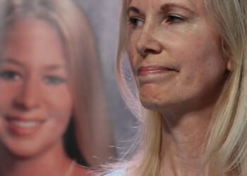 Beth Holloway, the mother of murdered American high school graduate Natalee Holloway, is pictured with a photo of her daughter in a 2010 file photo.