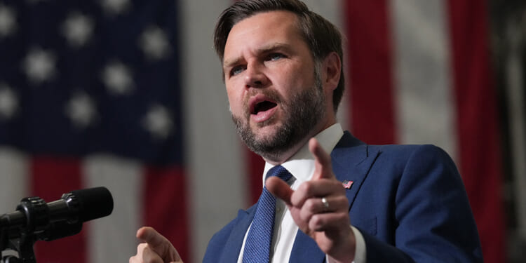 Vice President JD Vance speaks to a crowd.
