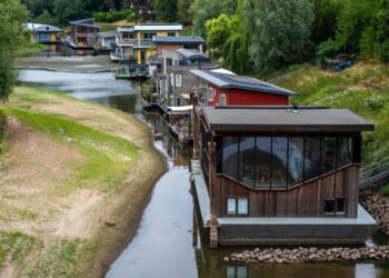 Dry, hot summers are putting Dutch dikes at risk and threatening German river trade