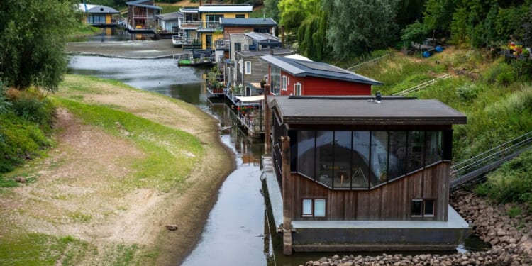 Dry, hot summers are putting Dutch dikes at risk and threatening German river trade