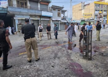A suicide bomber strikes an anti-militant rally in northwestern Pakistan, killing at least 14
