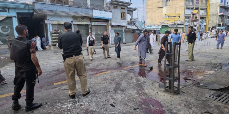 A suicide bomber strikes an anti-militant rally in northwestern Pakistan, killing at least 14