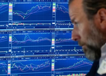 U.S. stocks jump as employers unexpectedly cut 23,000 jobs, raising hopes for easier rate policy