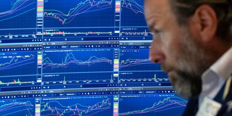 U.S. stocks jump as employers unexpectedly cut 23,000 jobs, raising hopes for easier rate policy