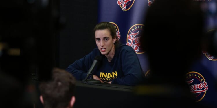 Indiana Fever guard Caitlin Clark answers questions at a media conference in Carver-Hawkeye Arena on March 4, 2025 in Iowa City, Iowa.