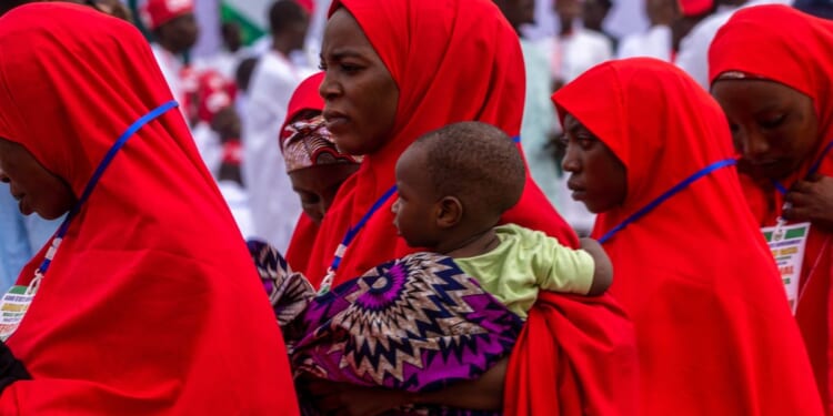 Widower who lost wife and 6 children in attack remarries in Nigerian mass wedding for 1,500 couples