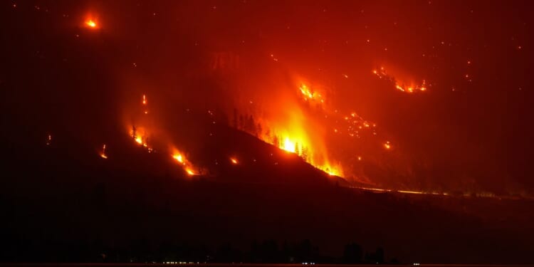 Wildfires burn across western U.S. and Canada as residents are evacuated