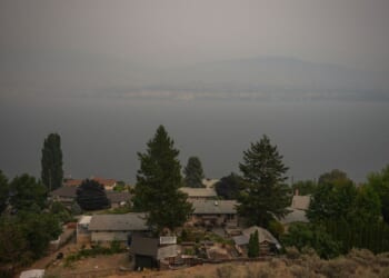 Canada puts the military on standby as British Columbia wildfires kill 1 and displace thousands