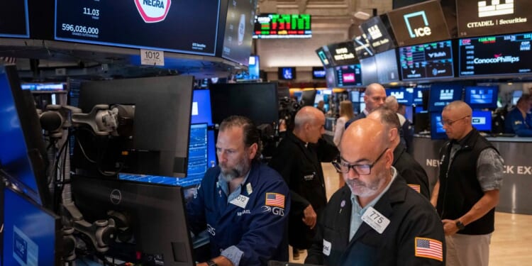 Wall Street flirts with a record after AI stocks rise and worries about inflation ease a bit