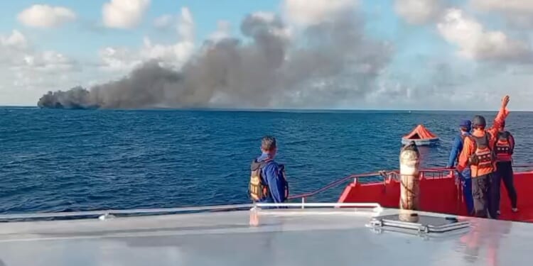 Rescuers evacuate more than 200 from a ferry fire that left at least 1 dead near Bali
