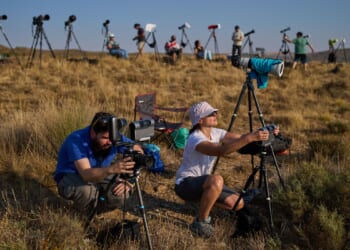 Millions crowd Spanish cities to see country’s first total solar eclipse in over a century