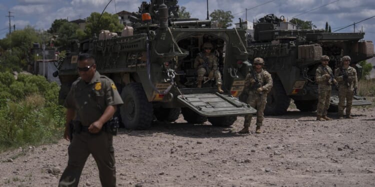 Justice Dept. says U.S. troops can arrest illegal immigrants beyond military property near border