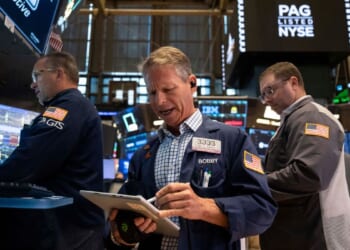 Falling oil prices help calm the stock and bond markets