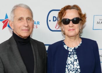 Dr. Anthony Fauci and his wife, Christine Grady, are pictured in a file photo from the 27th Annual White House Correspondents' Weekend Garden Brunch in April 2022 in Washington.