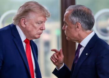 President Donald Trump is seen in a June 16 photo speaking with Canada's Prime Minister Mark Carney.