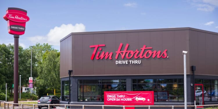 The exterior of Tim Hortons Drive Thru coffeehouse and restaurant in London, England, on July 10, 2024.
