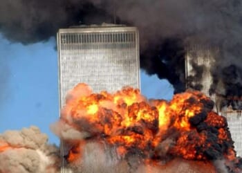 Fire and smoke surround the Twin Towers of New York City's World Trade Center during the terrorist attack of Sept. 11, 2001.