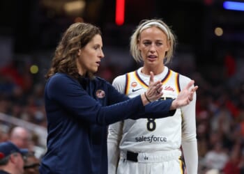 Sophie Cunningham of the Indiana Fever talks with head coach Stephanie White during the game against the Phoenix Mercury at Gainbridge Fieldhouse on June 24, 2026, in Indianapolis, Indiana.