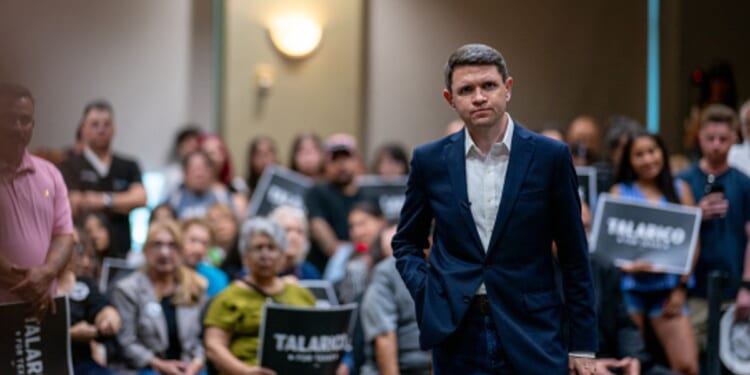 James Talarico, Democratic Senatorial candidate, stands looking defeated with a crowd on July 13, 2026 in Eagle Pass, Texas.