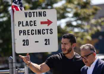 Democratic candidate for U.S. Senate in Michigan Abdul El-Sayed visits a polling place as residents cast their votes.