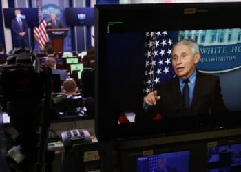 In front of the TV cameras, then-National Institute of Allergy and Infectious Diseases Director Dr. Anthony Fauci, seen in a photo from April 13, 2021, downplayed any risks to pregnant women from the COVID vaccine. In private texts, however, he sang a different tune.