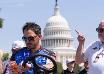 Graham Rahal rides a cart on the Freedom 250 Grand Prix track along the National Mall on Aug. 21, 2026, in Washington, D.C.