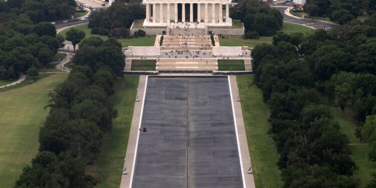 Justice Department moves to drop case against ex-Olympian charged with damaging Reflecting Pool