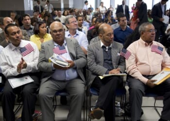 A naturalization ceremony takes place on June 4, 2010, at the U.S. Citizenship and Immigration Services offices of the Federal Building in New York.