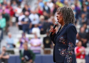 Martha Reeves sings the National Anthem before the Women's Pro Baseball League Opening Day between New York Heights and the Los Angeles Queens at Robin Roberts Stadium on Aug. 1, 2026, in Springfield, Illinois.
