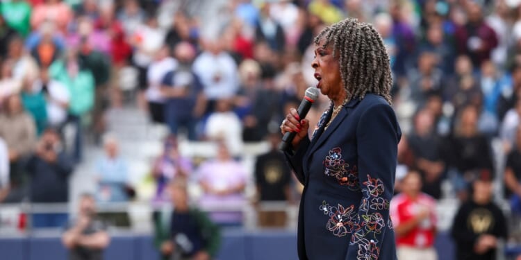 Martha Reeves sings the National Anthem before the Women's Pro Baseball League Opening Day between New York Heights and the Los Angeles Queens at Robin Roberts Stadium on Aug. 1, 2026, in Springfield, Illinois.